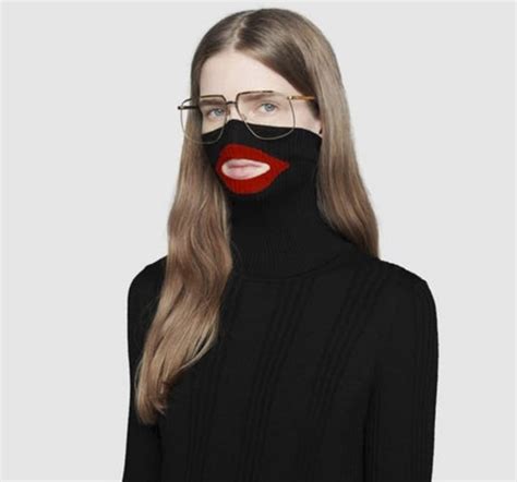 Gucci creative director says unintended racist imagery of $890 .